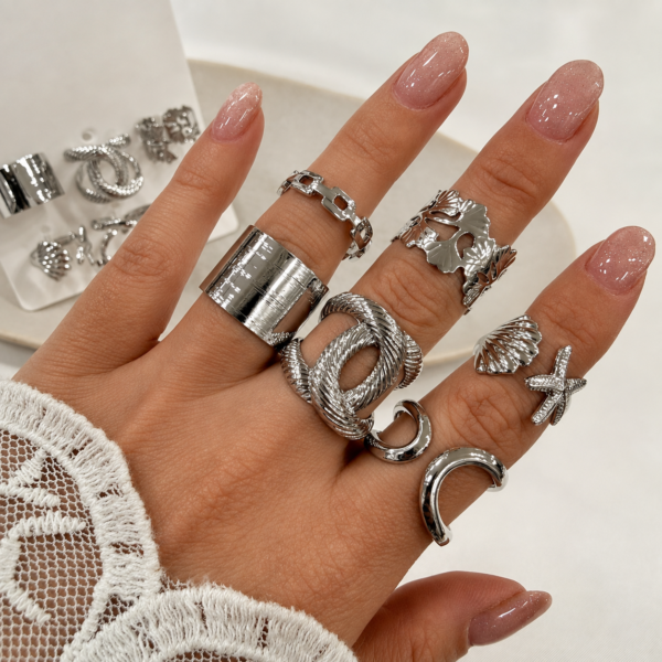 a 0 set x 6 anillos plateados modelo 15