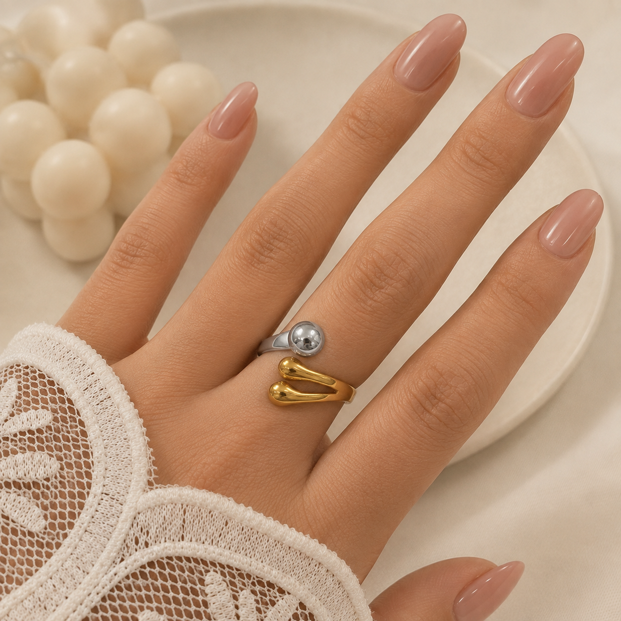 anillo astrid 34 regulable a. quirurgico combinado dorado