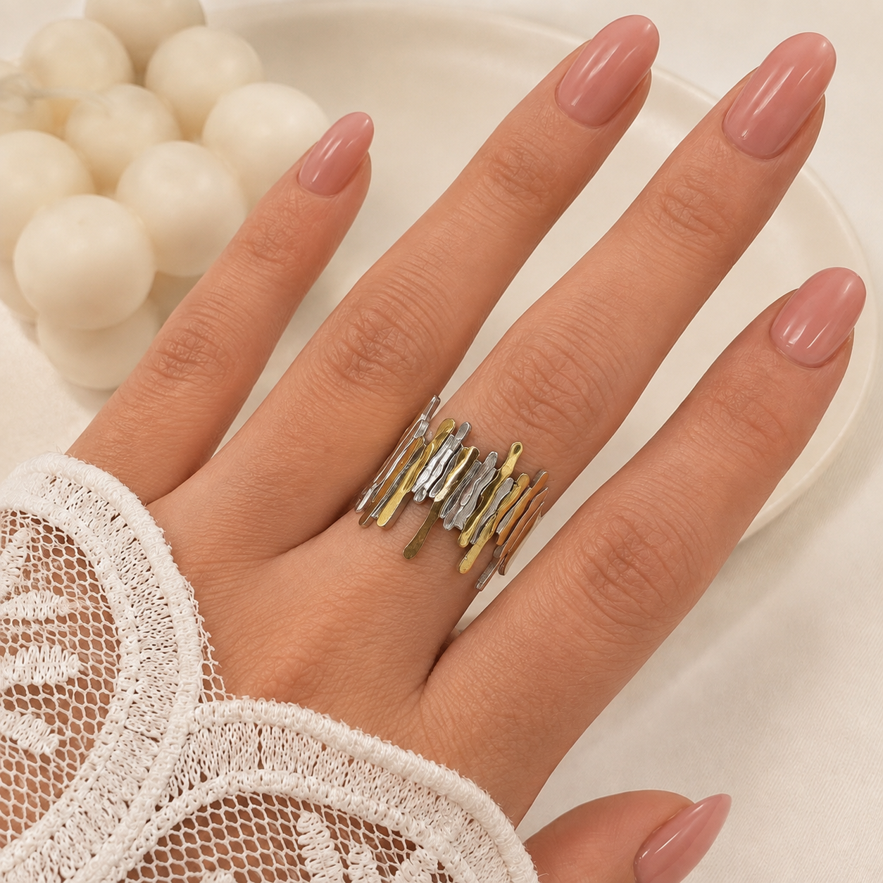 anillo astrid 25 regulable a. quirurgico combinado dorado