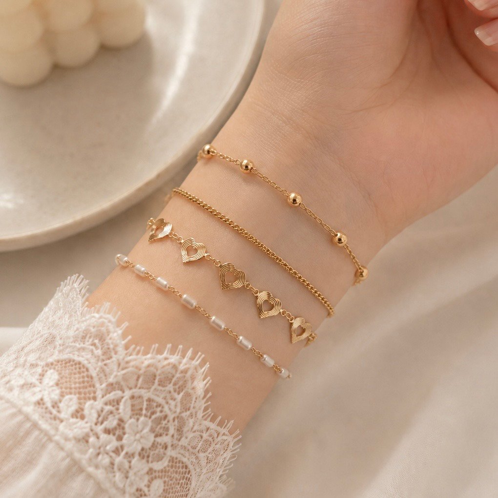 a 0 set x 4 pulseras dorada modelo J