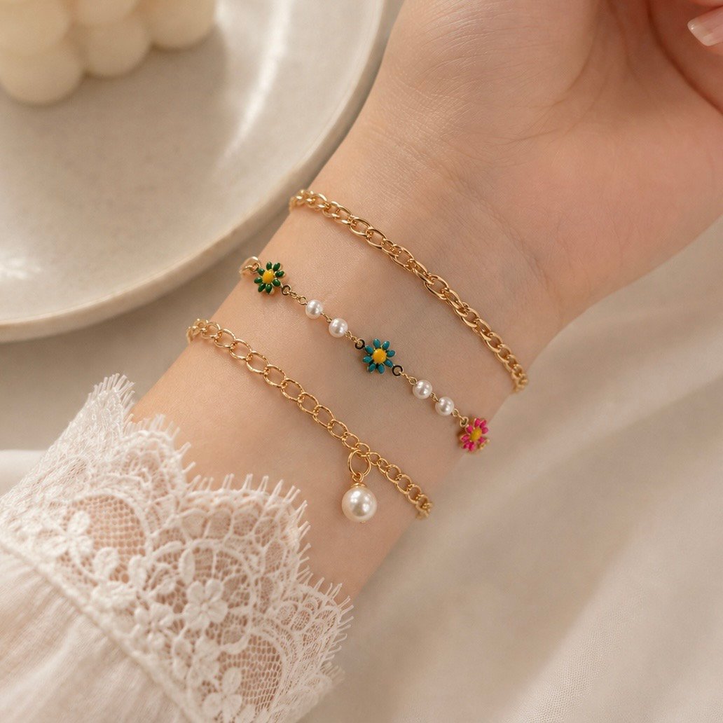 a 0 set x 3 pulseras dorada modelo Y