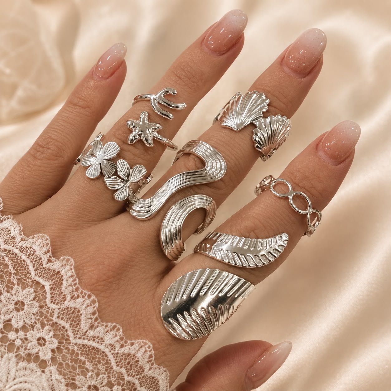 a a kit x 6 anillos ACERO BLANCO REGULABLES mix 8