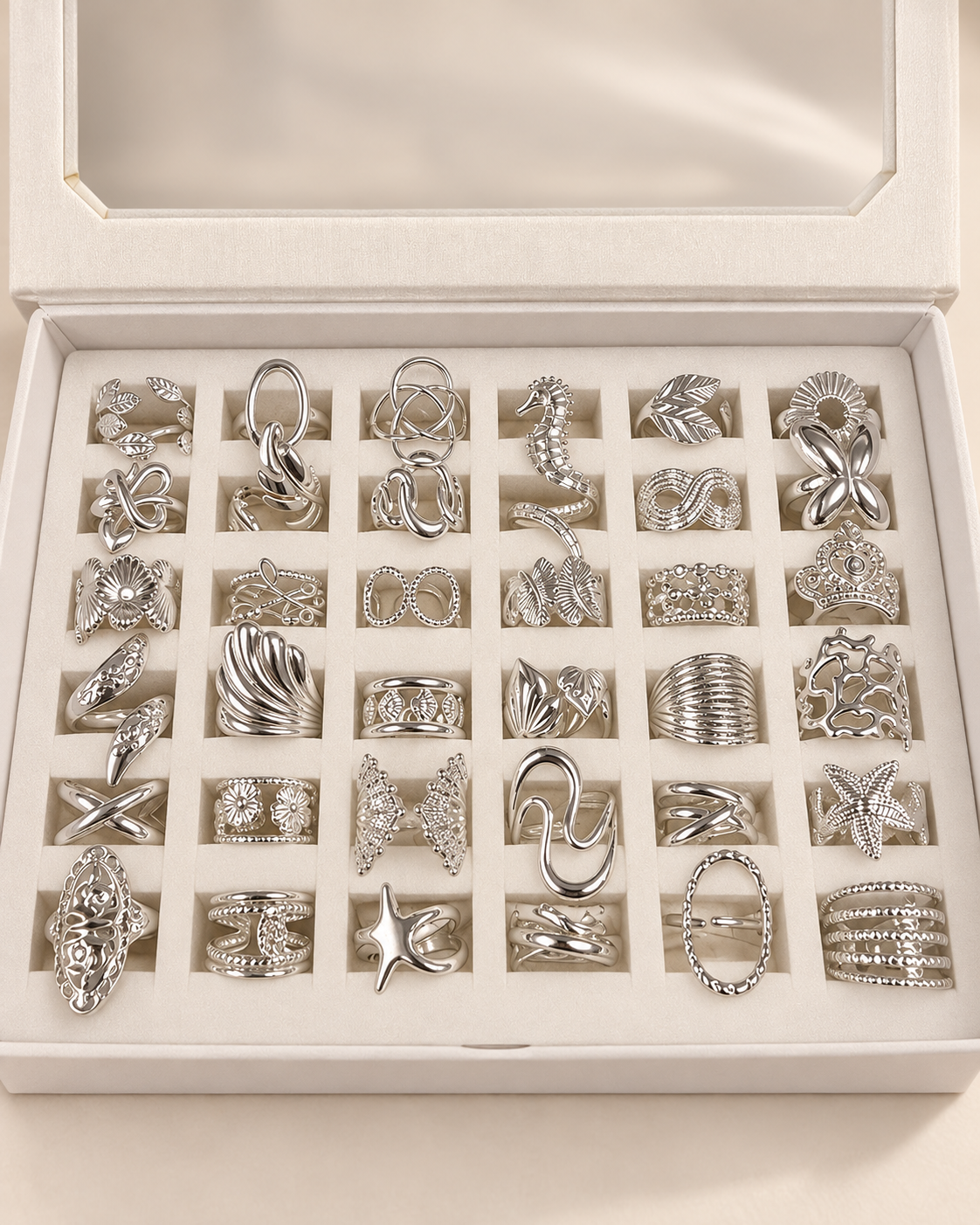 a a kit CAJA x 36 anillos regulables ACERO BLANCO con caja de regalo mod 3