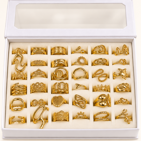 a caja x 36 anillos dorados REGULABLES Mod 4 con exhibidor de regalo.