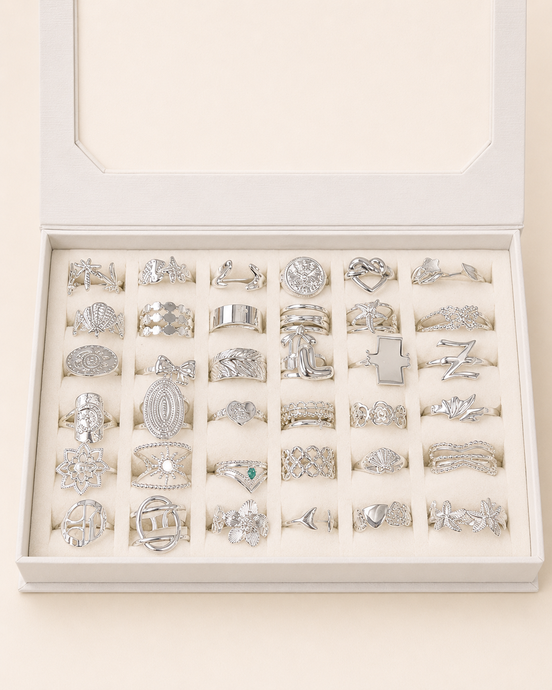 a a kit CAJA x 36 anillos regulables ACERO BLANCO con caja de regalo mod 5