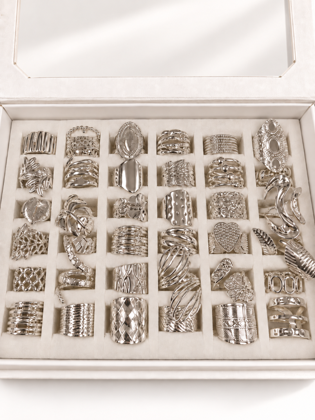 a a kit CAJA x 36 anillos regulables ACERO BLANCO con caja de regalo mod 8 PREMIUM