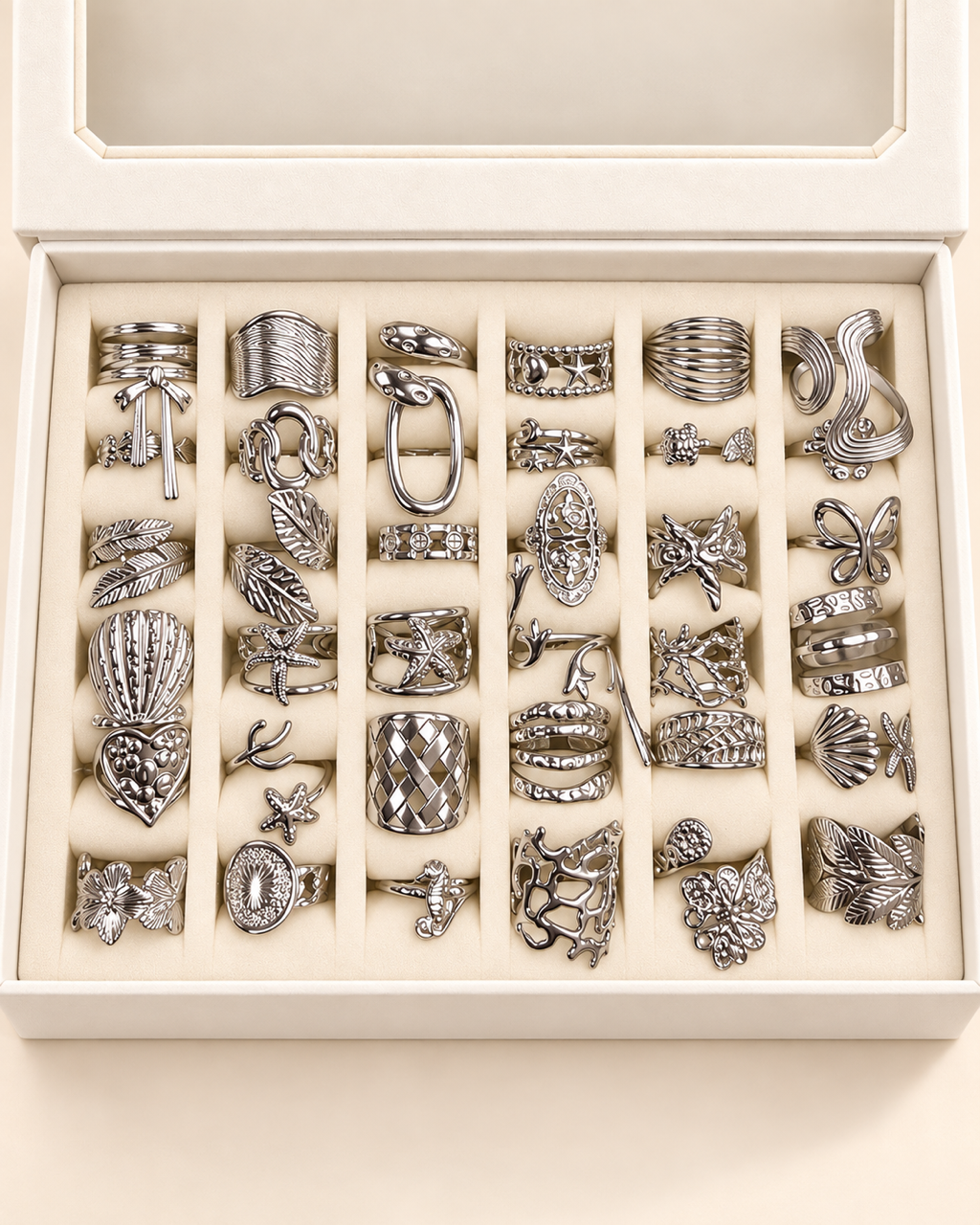 a caja x 36 anillos surtidos con caja exhibidora surtidos talles regulables A. Quirúrgico mod 2