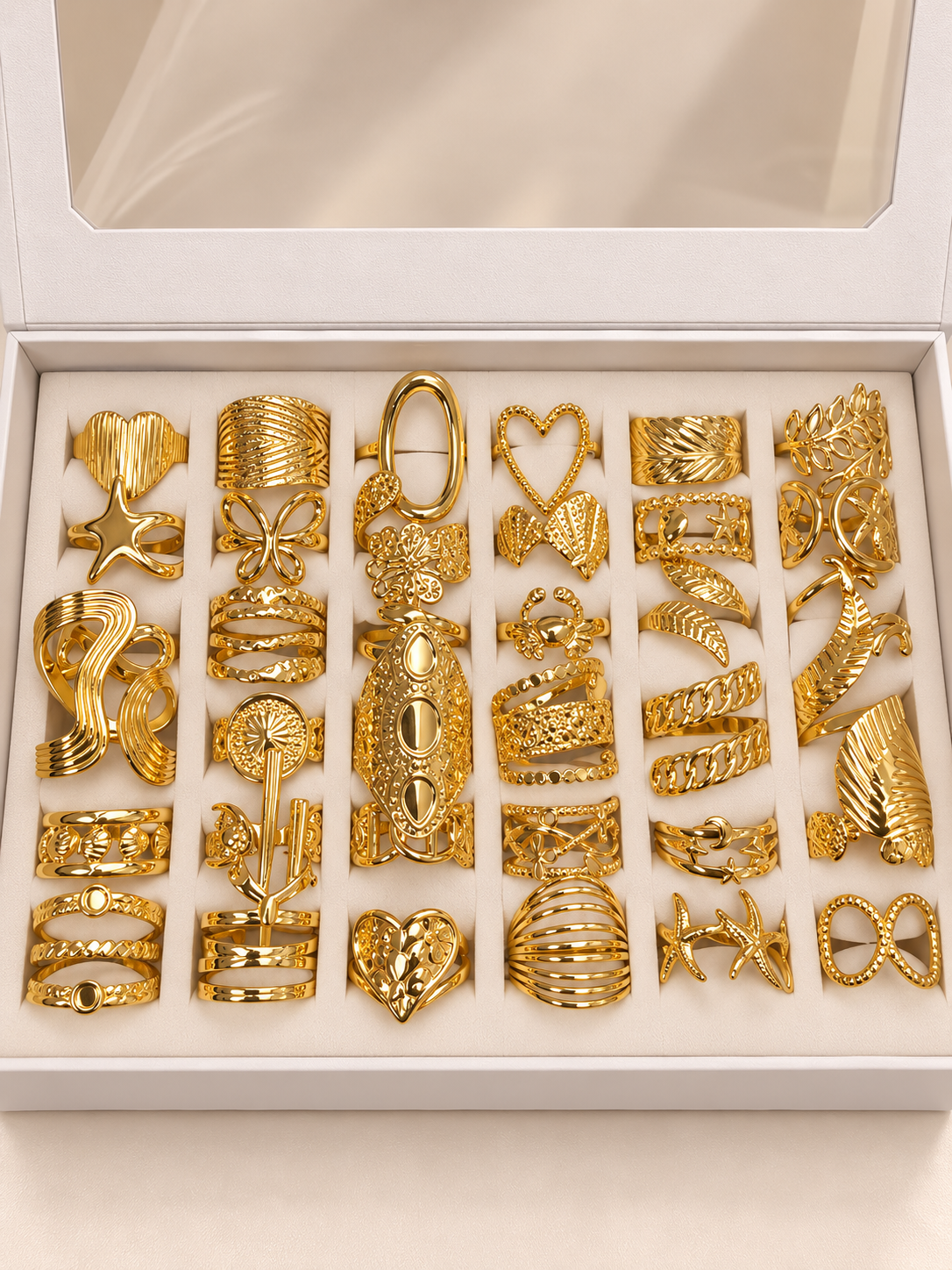a a kit CAJA x 36 anillos regulables ACERO DORADO con caja de regalo mod 5