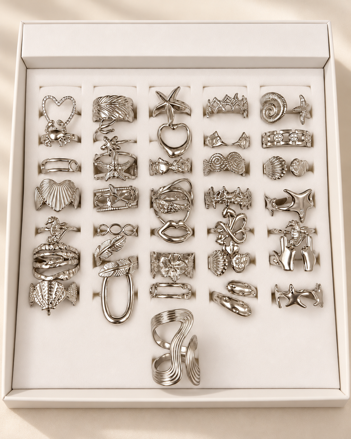 a caja x 36 anillos surtidos con caja exhibidora surtidos talles regulables A. Quirúrgico mod 5