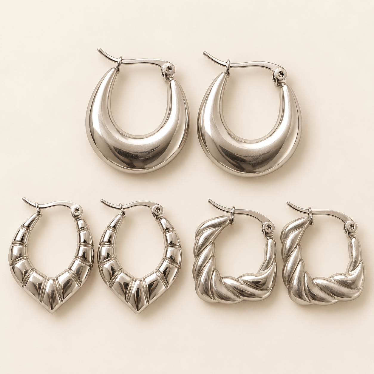 a a set x 3 pares argollas trabajadas mod 1 a.q