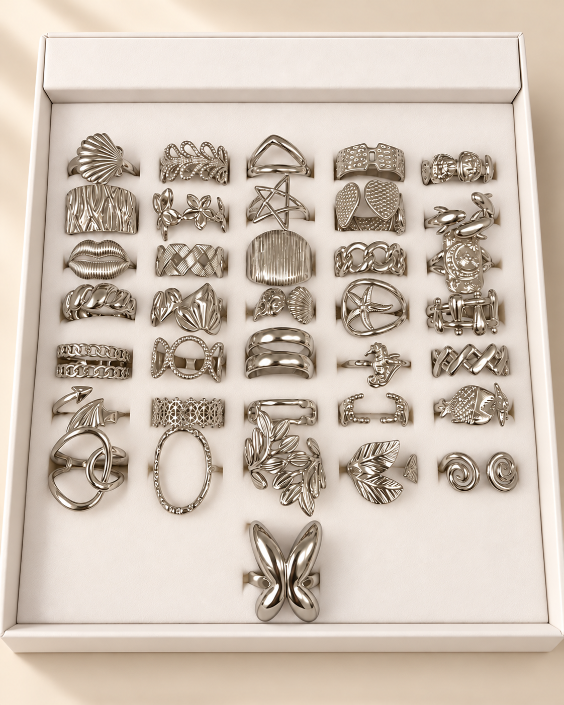 a caja x 36 anillos surtidos con caja exhibidora surtidos talles regulables A. Quirúrgico mod 4