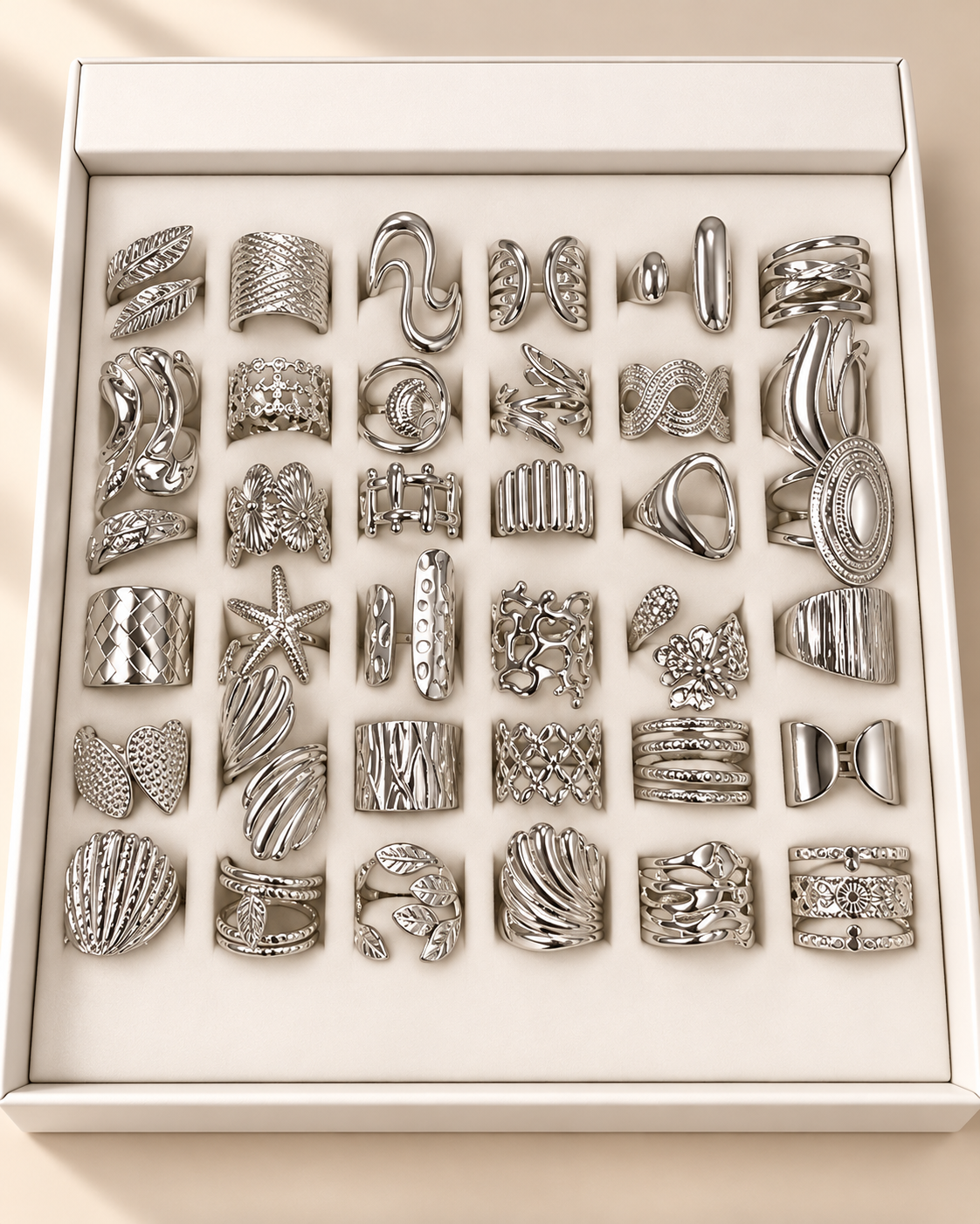 a a kit CAJA x 36 anillos regulables ACERO BLANCO con caja de regalo mod 6