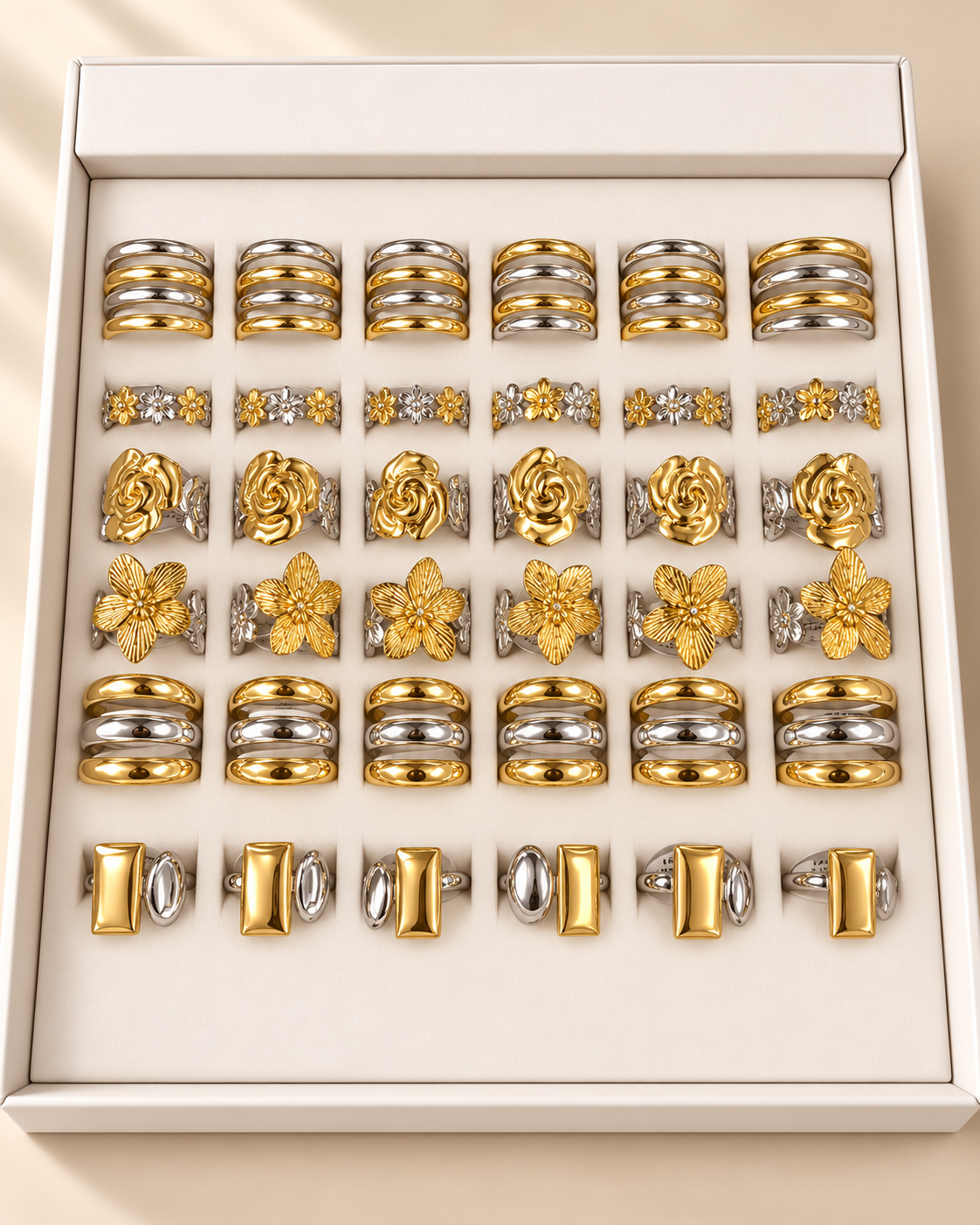 a caja x 36 anillos surtidos con caja exhibidora surtidos talles regulables A. Quirúrgico mod 6